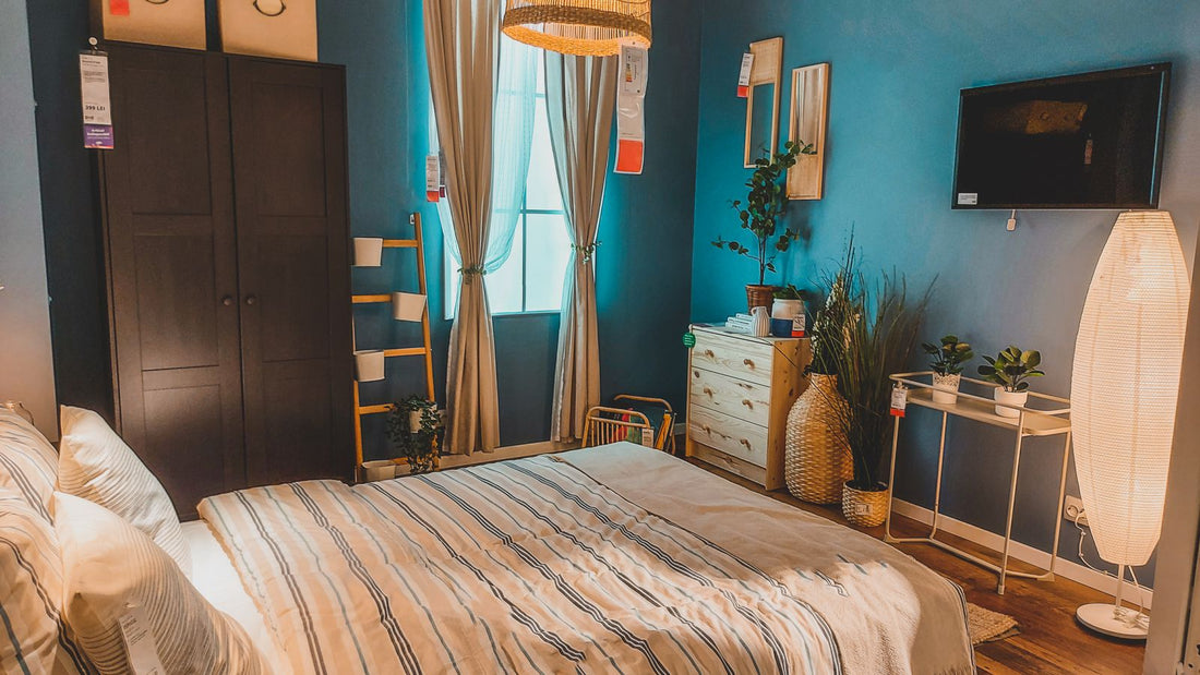 IKEA bedroom showroom with a wardrobe, chest of drawers and other furniture