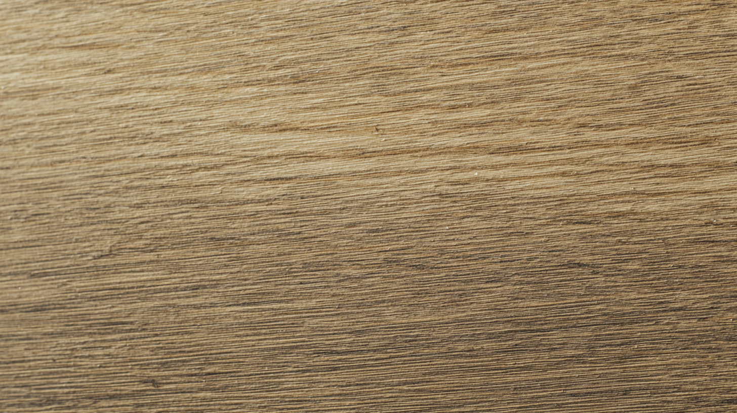Close up of warm oak wood grain on a premium self adhesive vinyl wrap surface