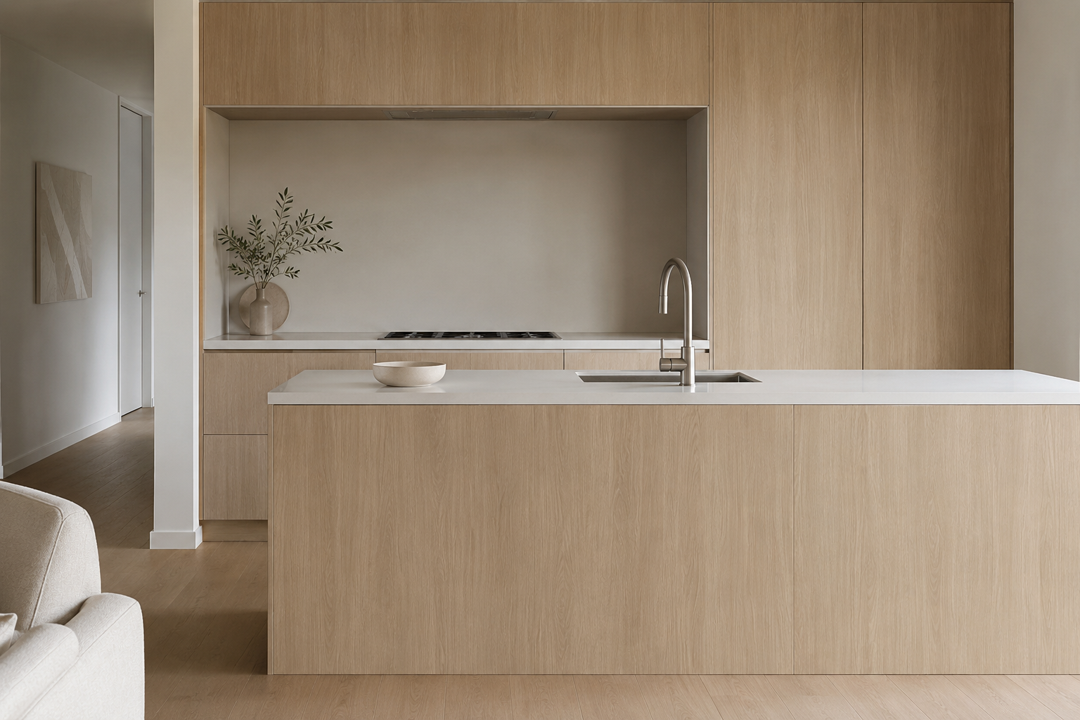 Pale blonde oak peel and stick vinyl wrap on flat front cabinets in a renter friendly kitchen makeover