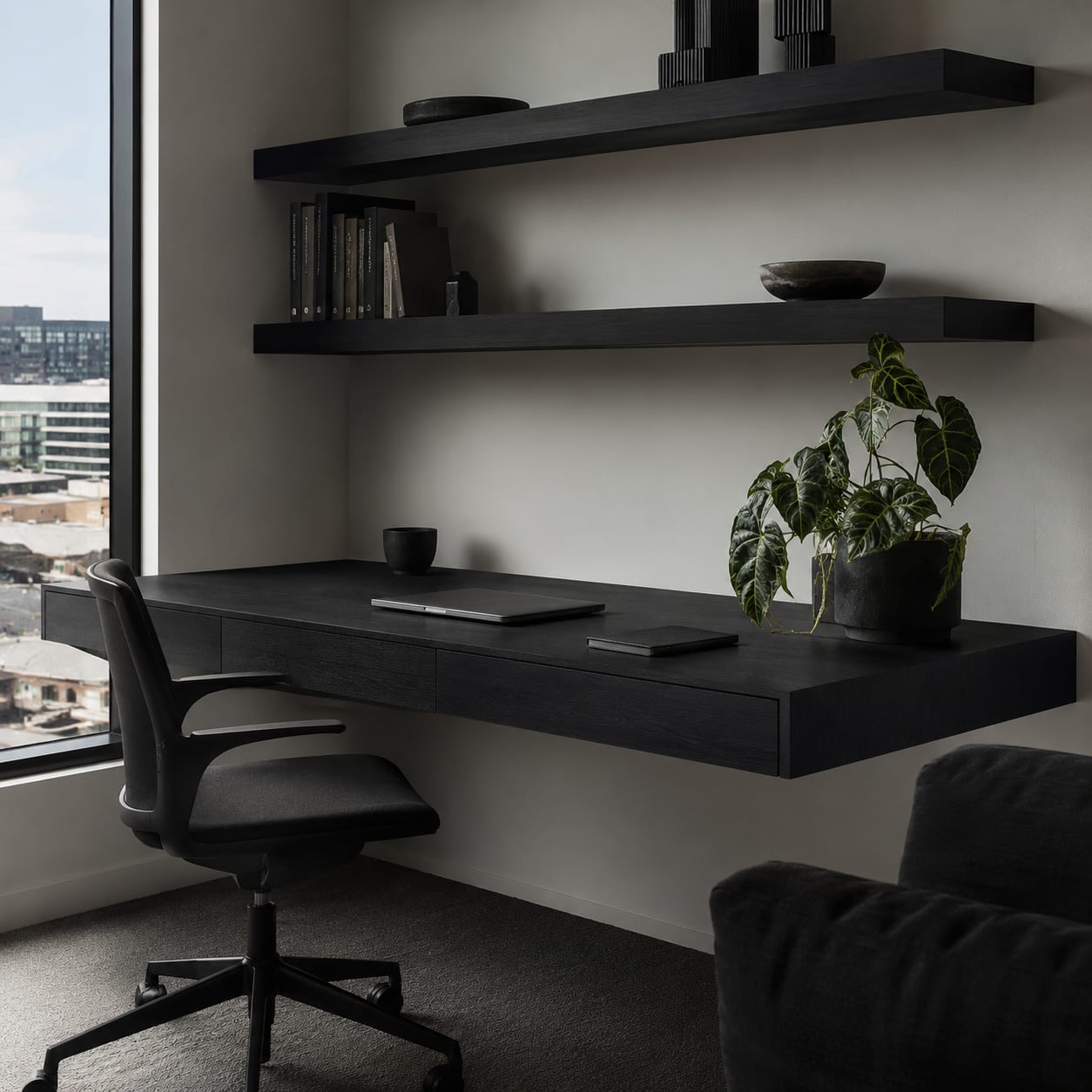 A floating desk wrapped in matte Kuro Sumi