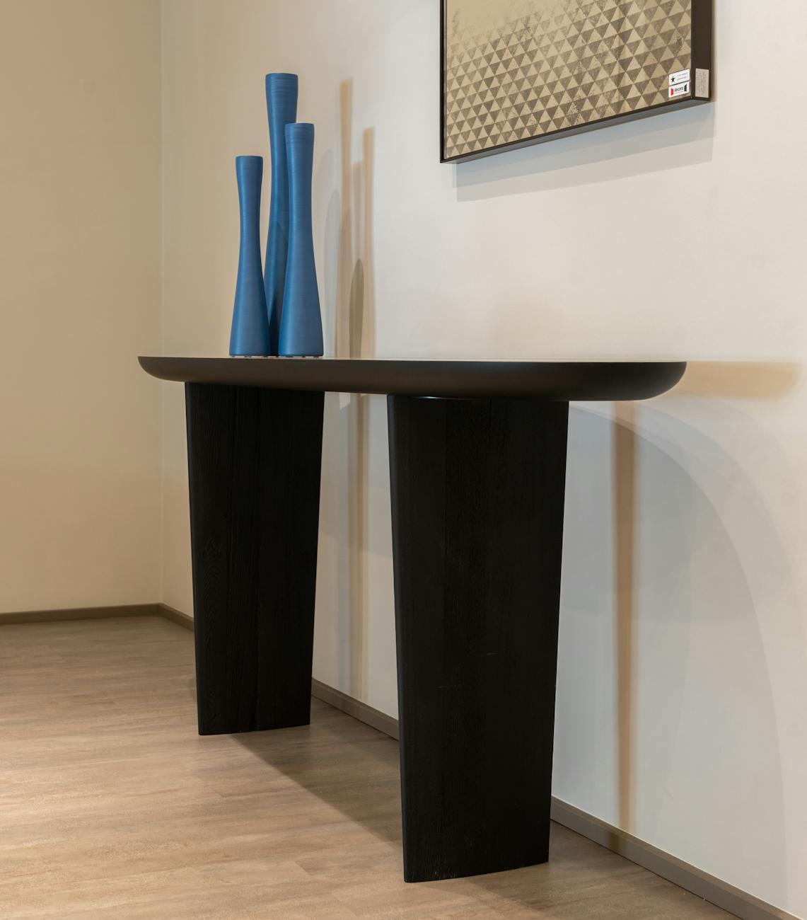 An entry console wrapped in near black Kuro Sumi
