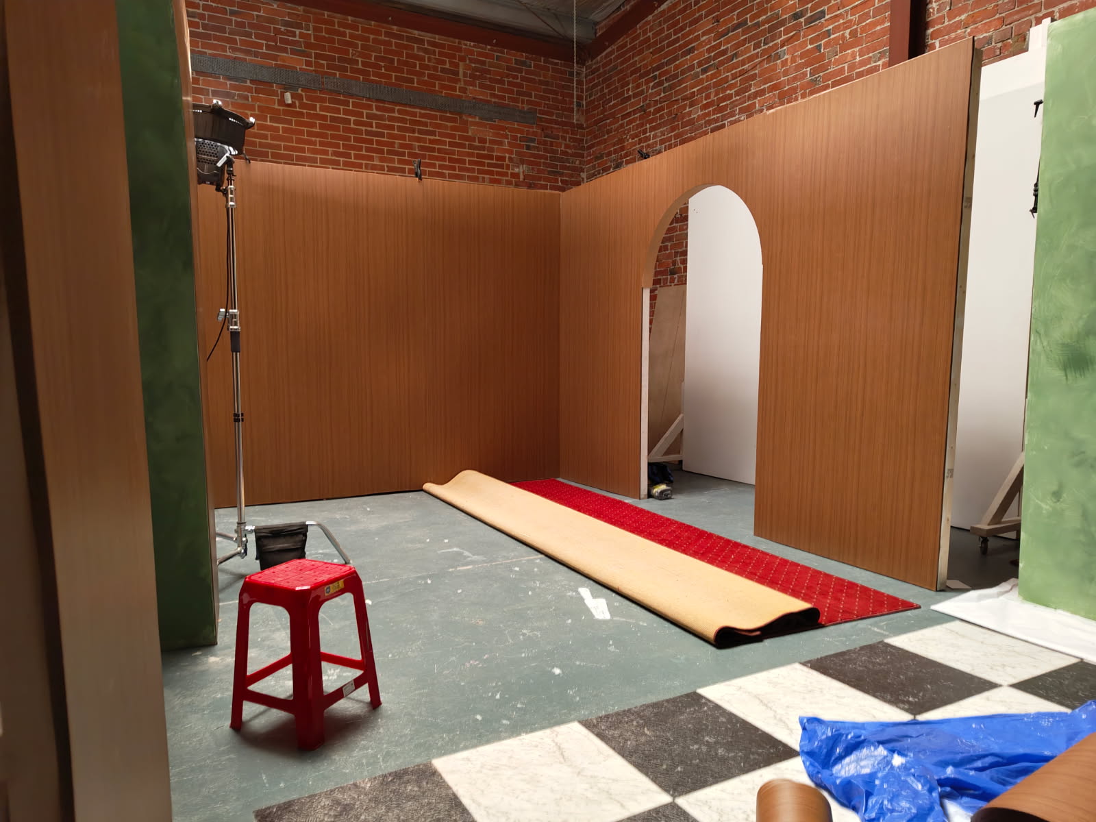 Beam Studios commercial photography set under construction, finished with French Chestnut Velven architectural film