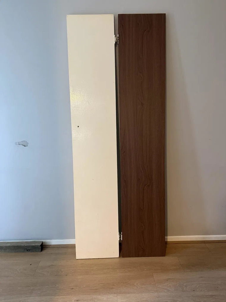 Customer wardrobe door before and after, with the cream door beside the same door wrapped in warm brown Natural Walnut wood grain